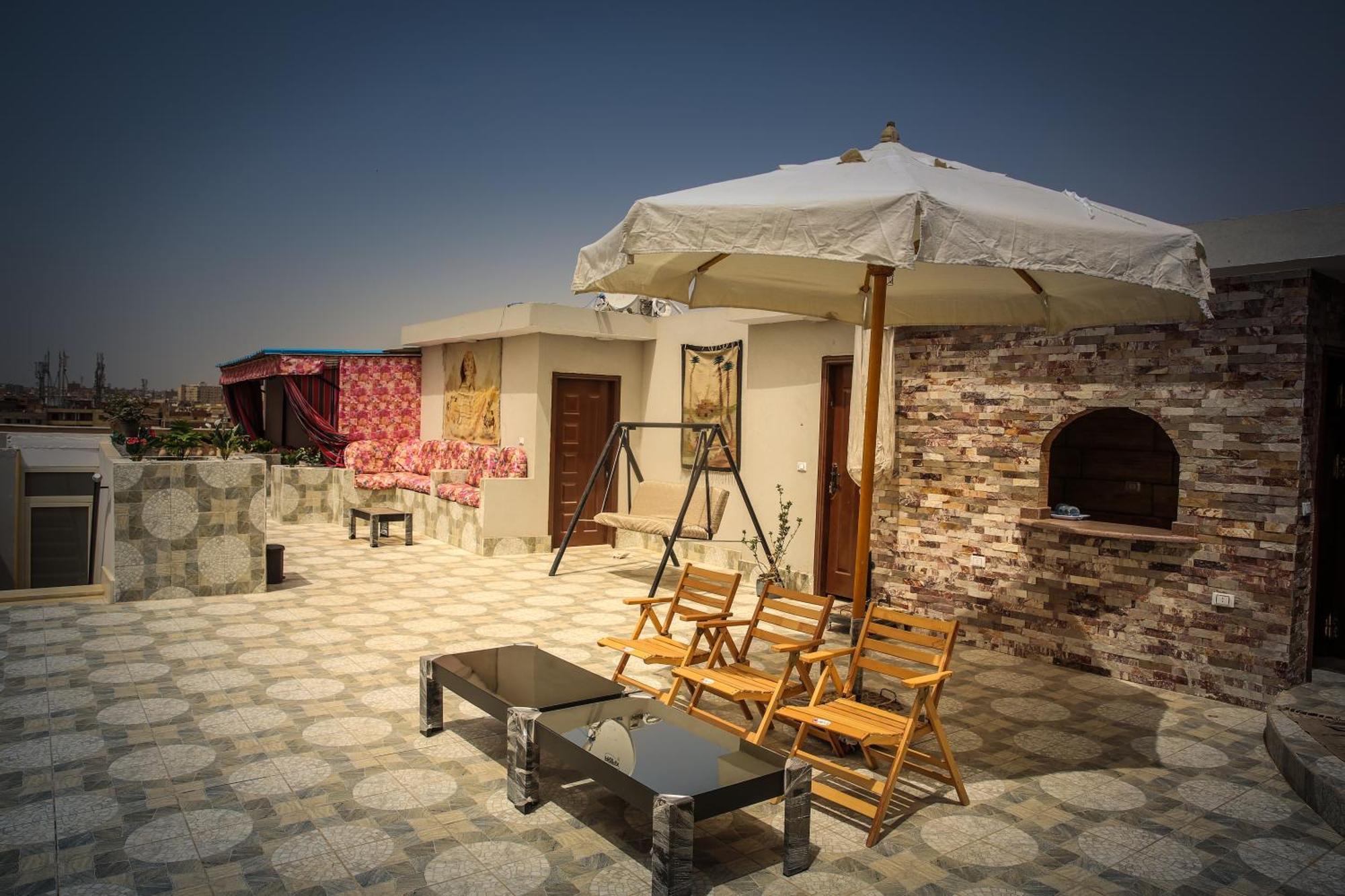 Queen Pyramids View Inn Kafret el-Gabal Extérieur photo